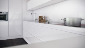 cocina monocromática con electrodomésticos integrados